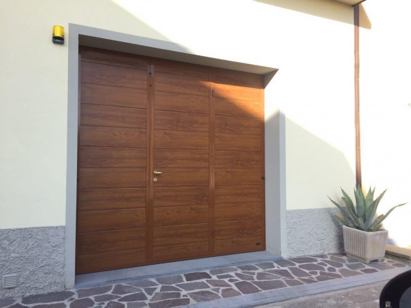 Basculante con Porta Pedonale
